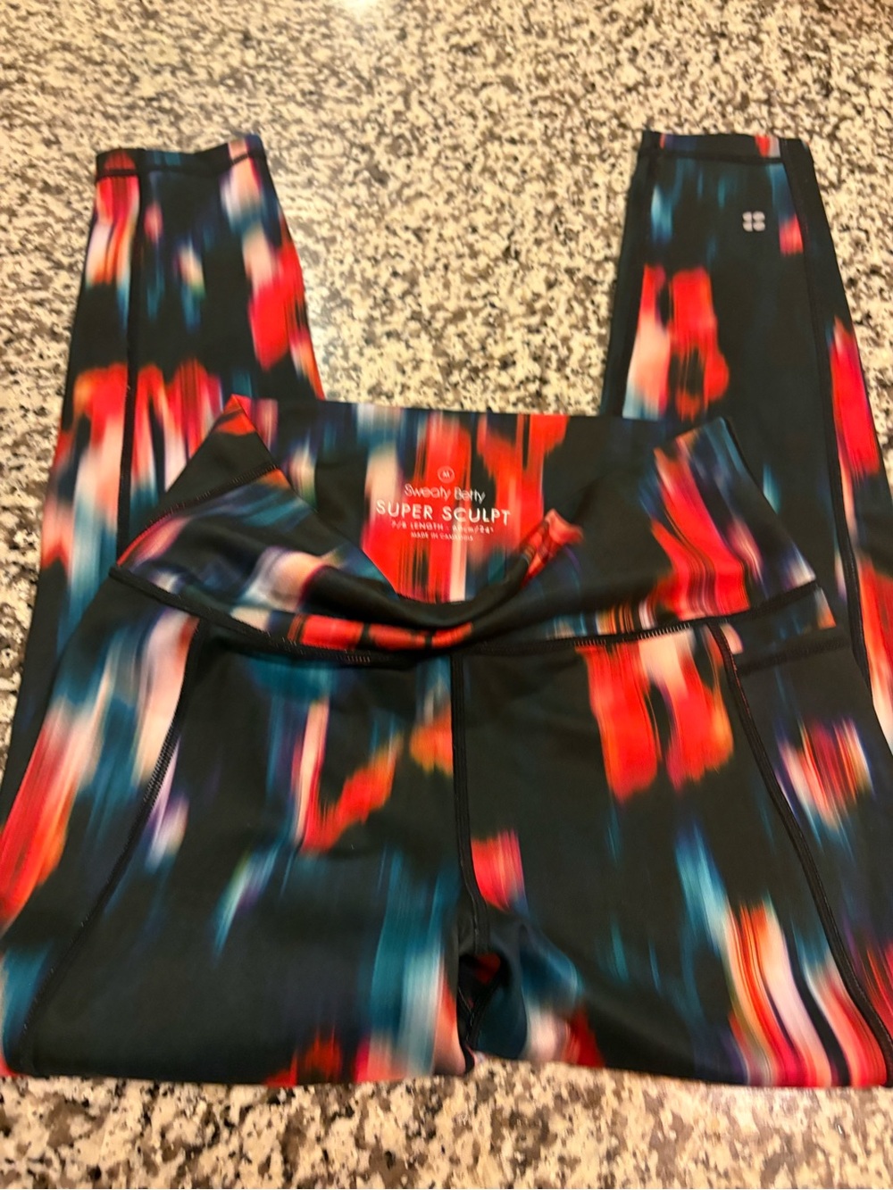 Sweaty Betty Super Sculpt Leggings in Black with Red & Blue Brushstroke Print